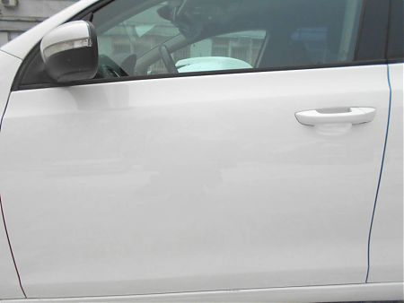 Замененная и покрашенная передняя левая дверь Volkswagen Golf